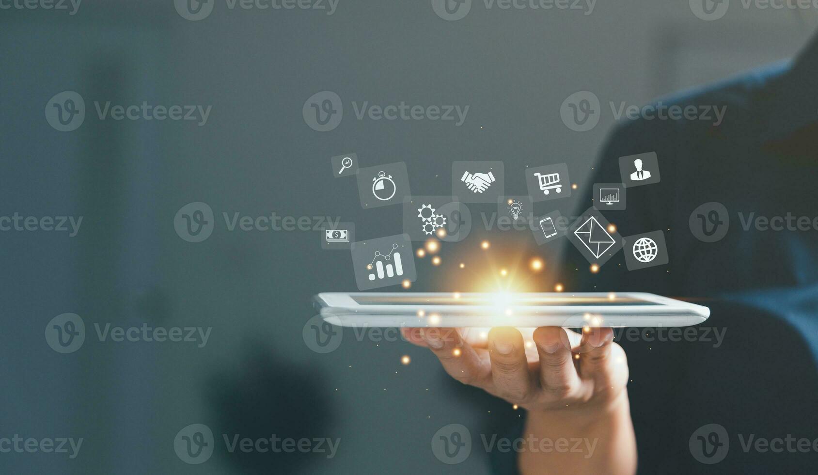 Businesswoman hand working on tablet and smart phone with virtual icon. Business internet connection application technology and digital marketing, Financial and banking, Digital link tech, big data. photo