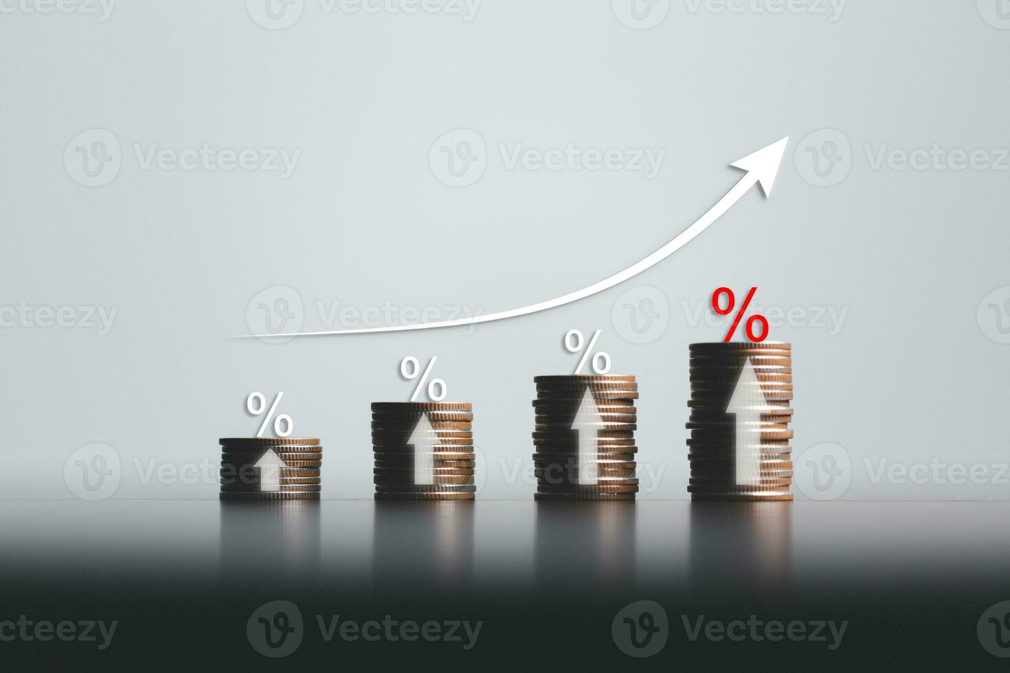 Stacked coins on wooden table with white and red illustration shows increasing of interest, financial concept. Interest rate financial and mortgage rates. Icon percentage symbol and arrow pointing up. photo