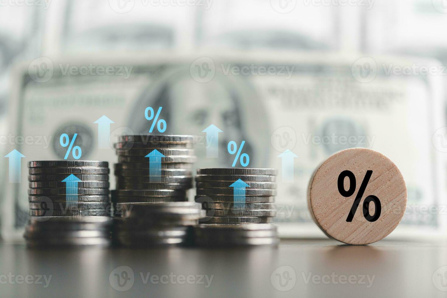 Stacked coins on wooden table with illustration shows increasing of interest rates, financial concept. Interest rate financial and mortgage rates. Icon percentage symbol and arrow pointing up. photo