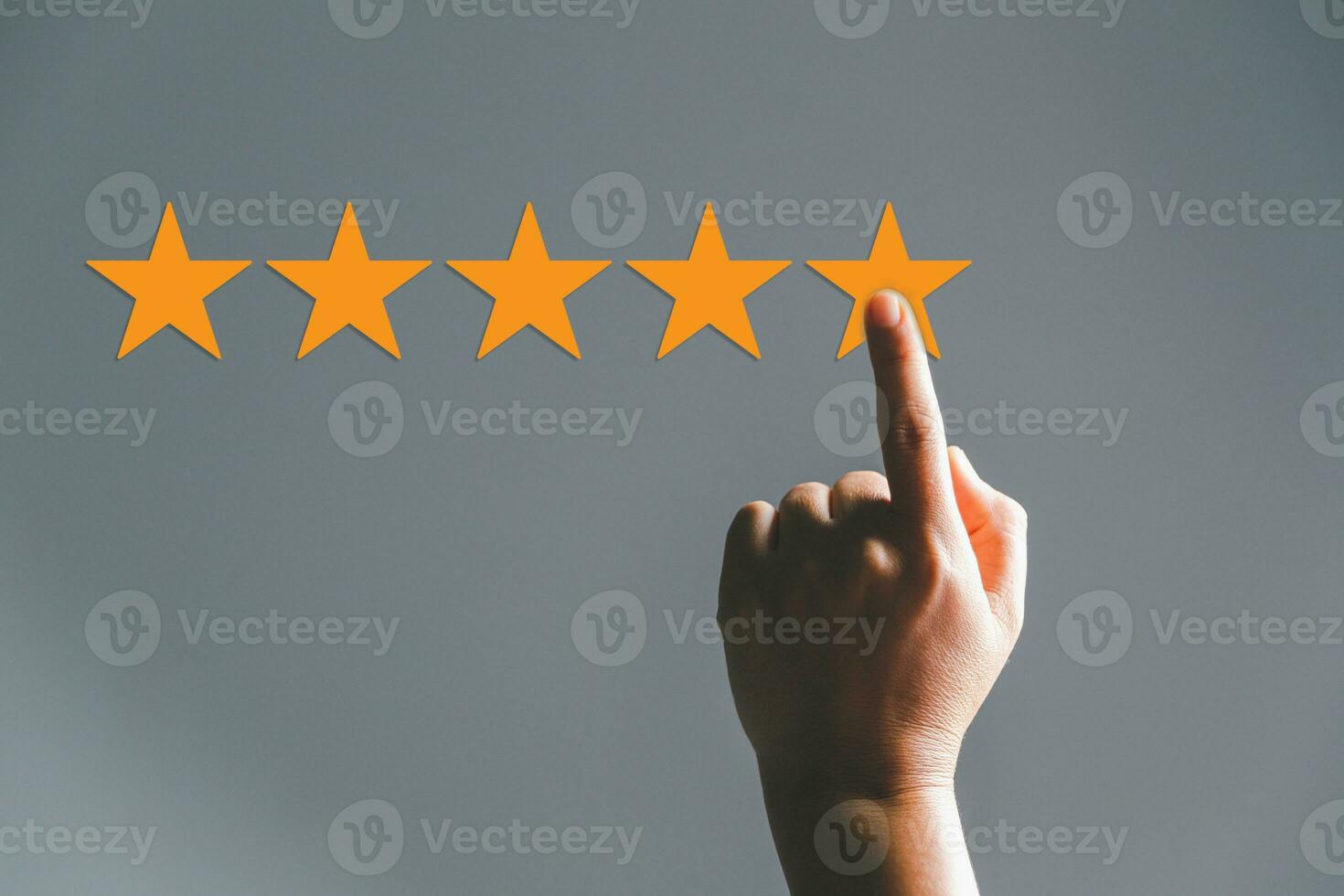 Customer experience with customer service and satisfaction concept. Woman finger touching on five star excellent rating on background, copy space, Customers show satisfaction and quality of services. photo
