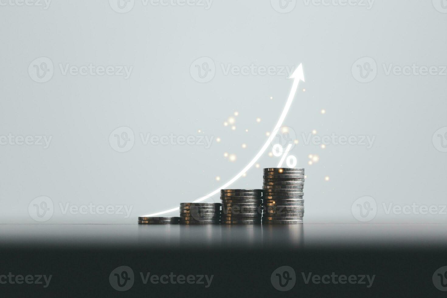 Stacked coins on wooden table with white illustration shows increasing of interest rates, financial concept. Interest rate financial and mortgage rates. Icon percentage symbol and arrow pointing up. photo