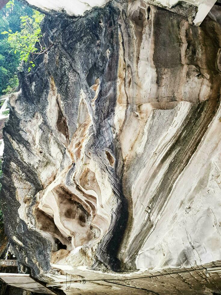 Ipoh, Malaysia in November 2019. Sam Poh Tong Temple is a Chinese temple built in a limestone cave and is the oldest and main cave temple in Ipoh, Perak, Malaysia. photo