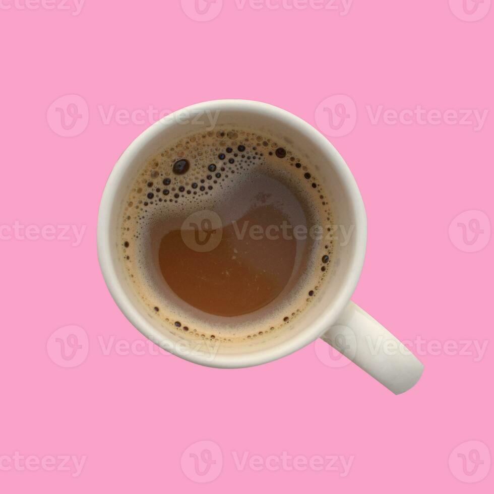 cup of hot coffee on pink background. photo