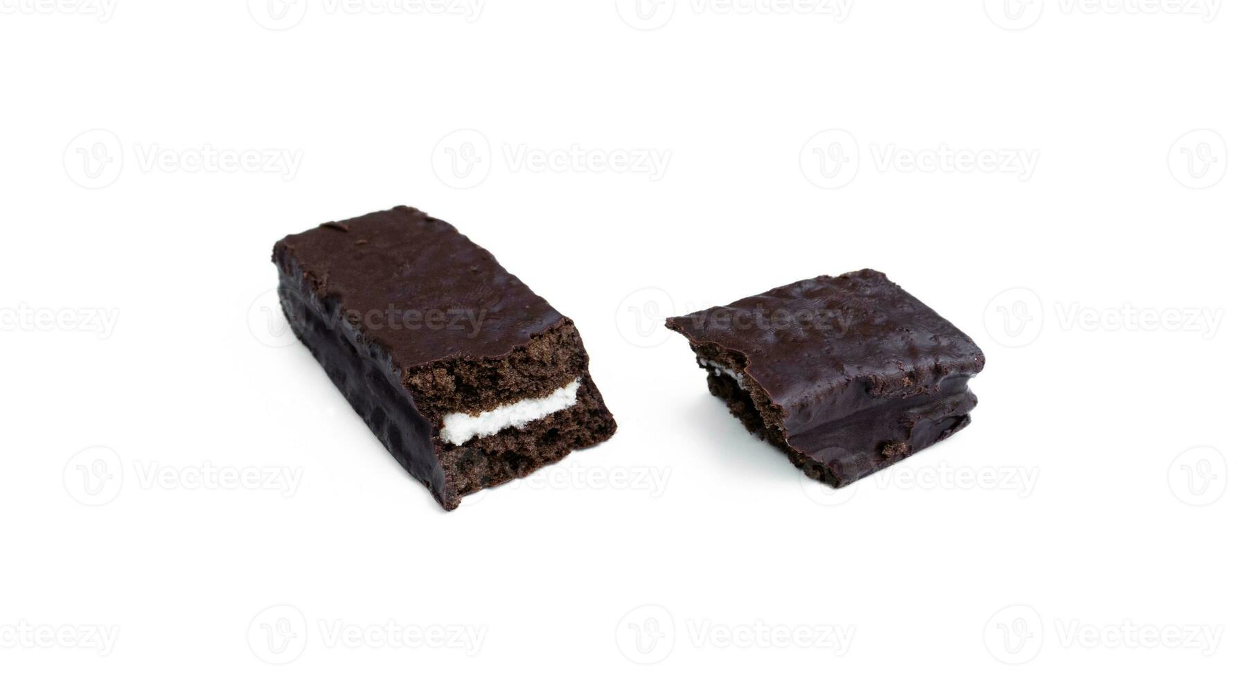 A chocolate soft cake filled with vanilla cream isolated on white background, after some edits. photo