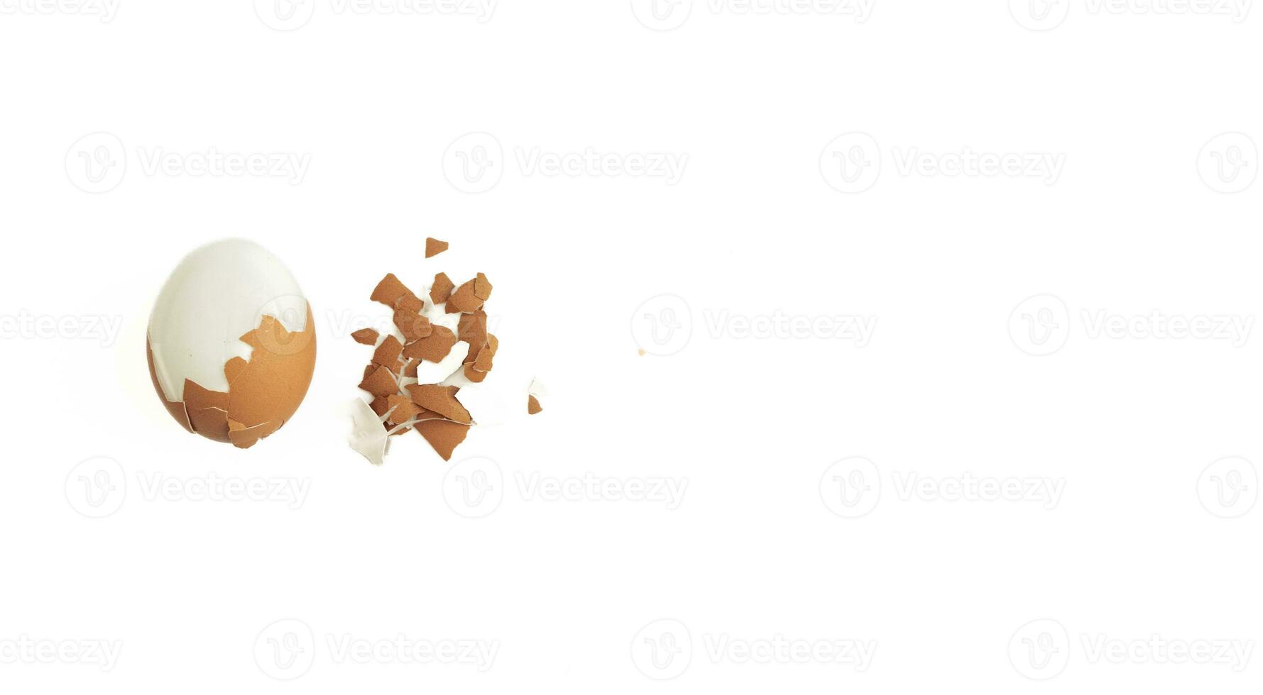 Cracked boiled egg isolated on white background, after some edits. photo