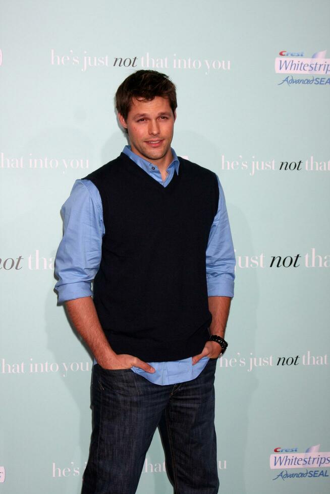 Justin Bruening arriving  at  the Premiere of Hes Just Not That Into You in Los Angeles CA on February 2 20092008 photo