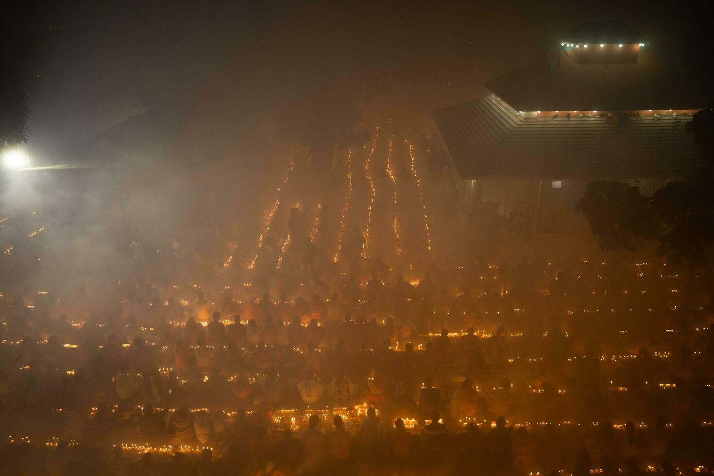 Narayanganj, Dhaka, Bangladesh, on November 12, 2022, Devotees offering prayers at the Shri Shri Lokanath Brahmachari Ashram temple during the Hindu religious fasting festival of Rakher Upobash. photo