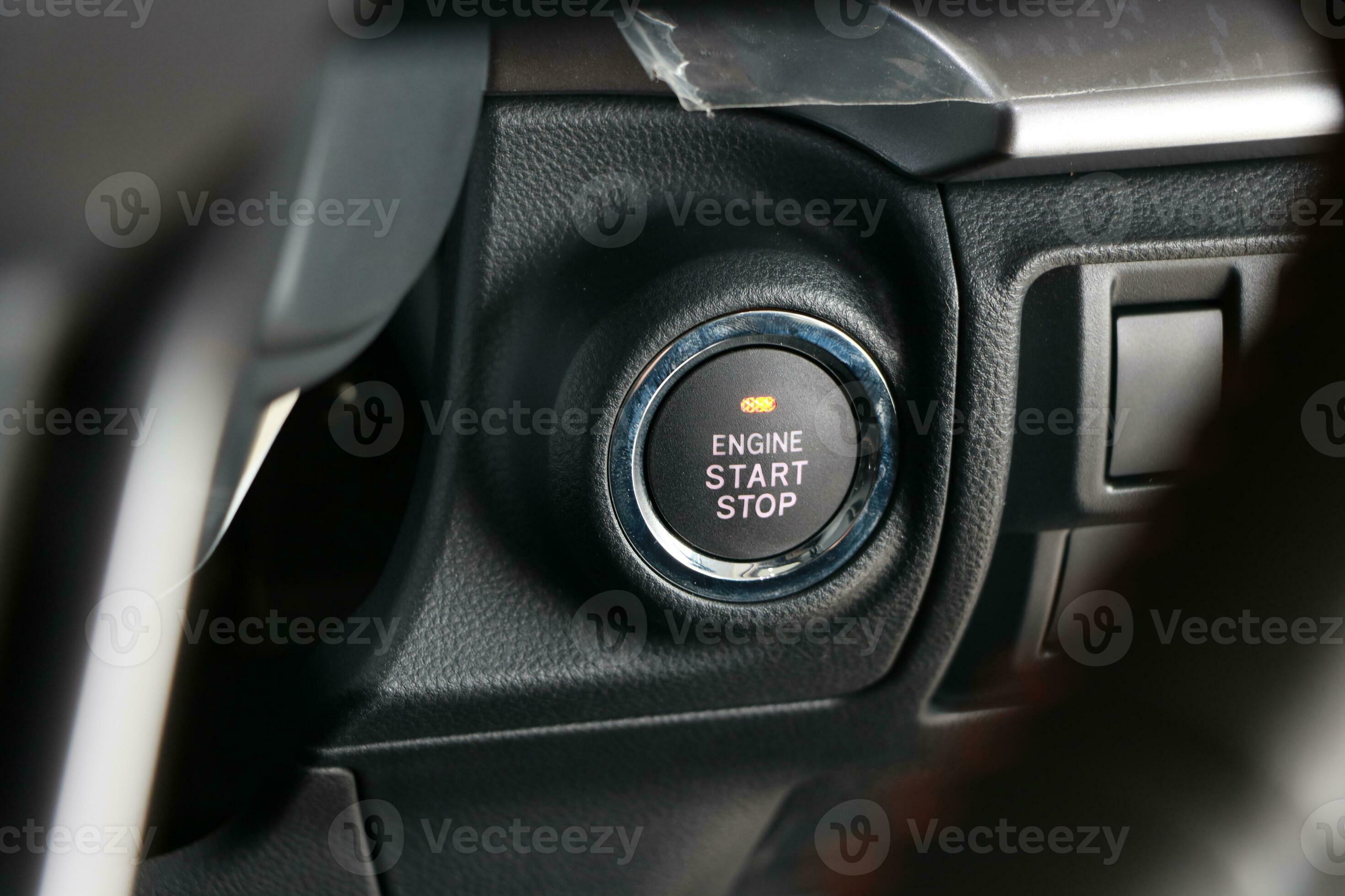 Push button to start and stop the engine 23507815 Stock Photo at Vecteezy