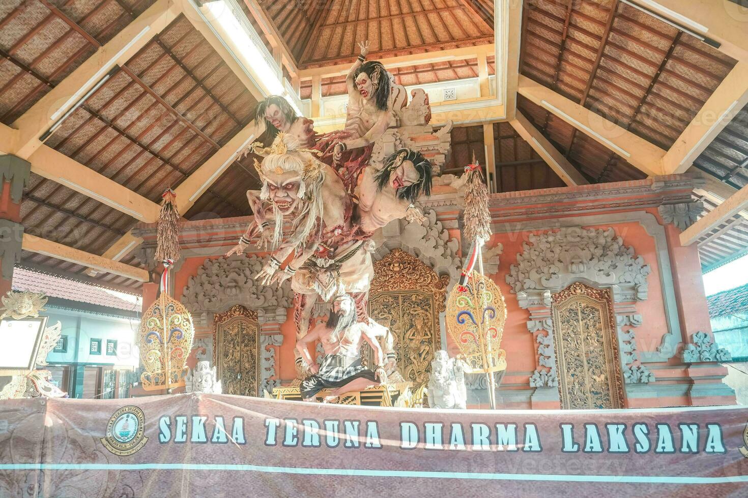 Ogoh-ogoh is a Balinese traditional giant puppet made of bamboo and paper mache, representing evil spirits. It's paraded around before the Nyepi Day to ward off negativity. photo