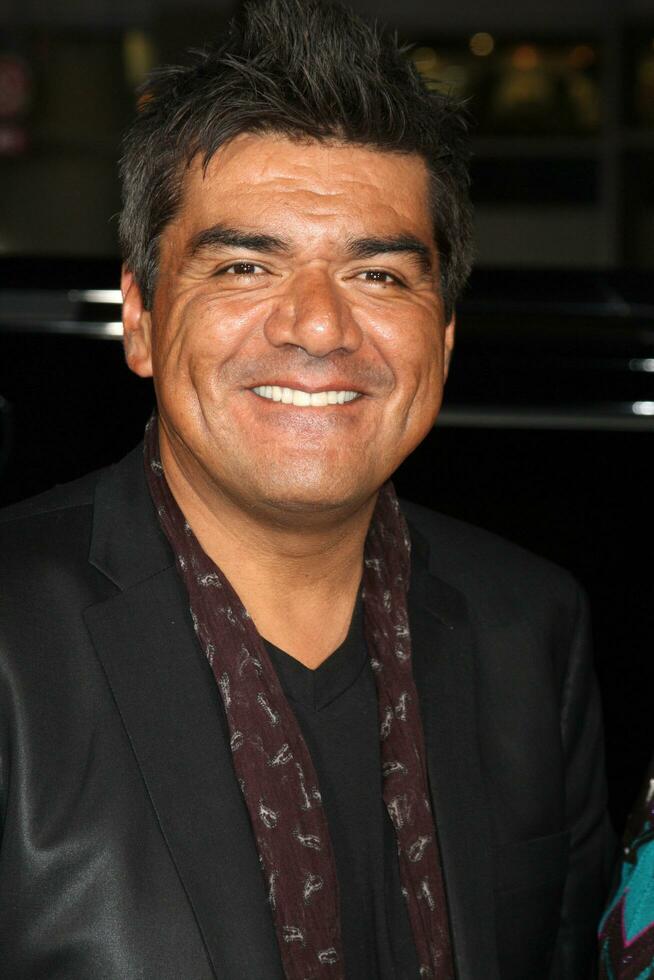 George Lopez arriving at  the All About Steve Premiere at Graumans Chinese Theater  in  Los Angeles CA on August 26 20092009 photo