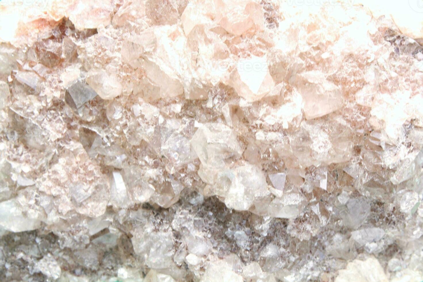Close-up of natural white amethyst druse geode mineral crystal unpolished semi-precious gemstone. Magic rock for ritual, witchcraft, spiritual practice, meditation. Esoteric life balance concept photo