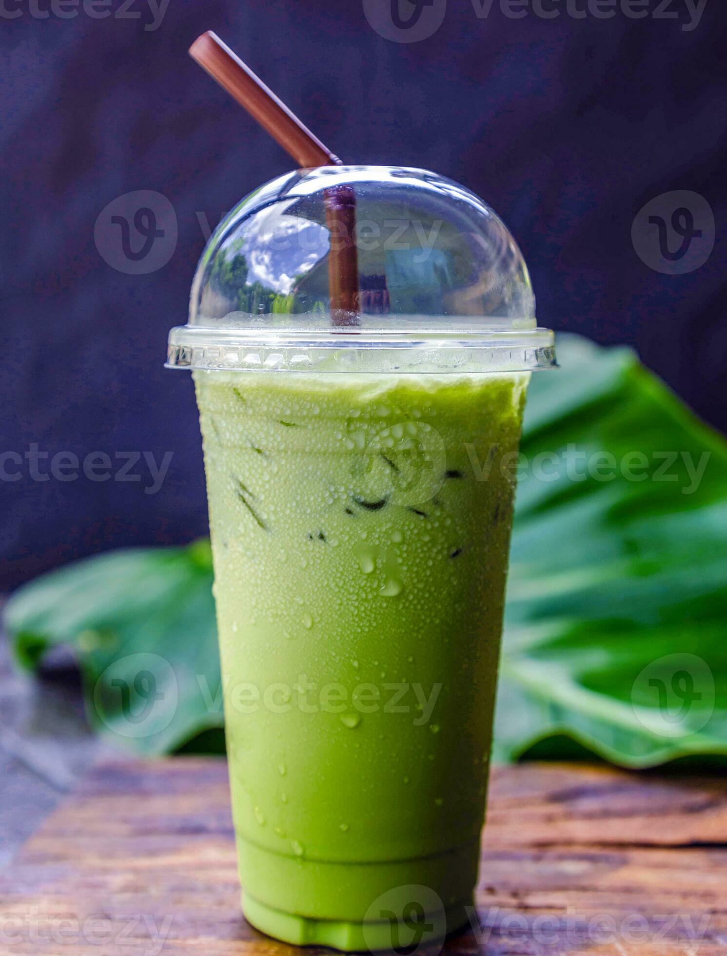 iced matcha latte, green tea with milk in a plastic glass with ice 23512785  Stock Photo at Vecteezy