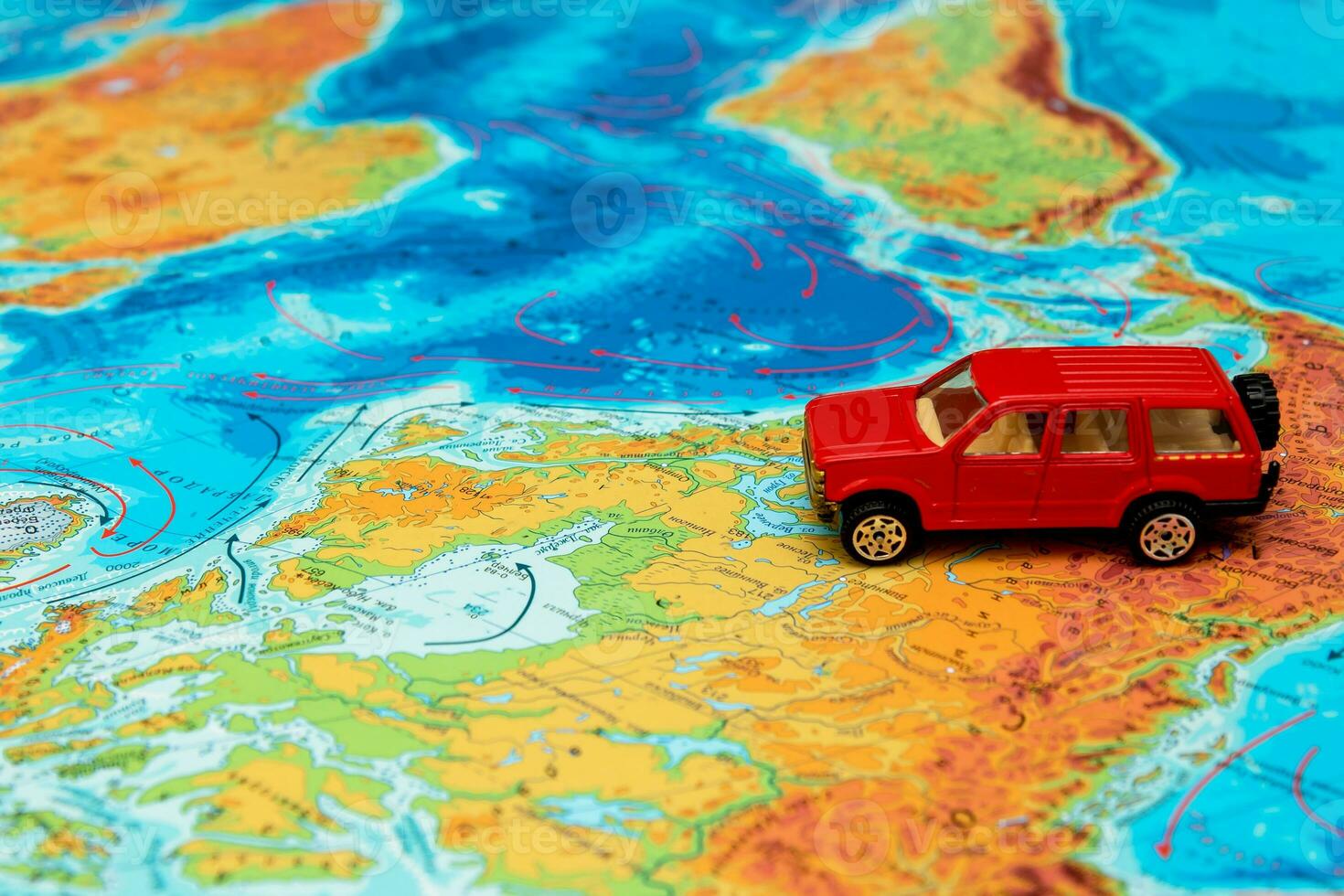 toy red car on north america map, travel content photo