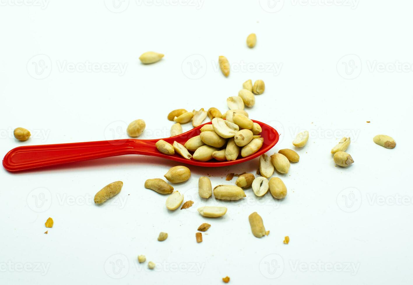 Dry shelled peanuts as background, top view. Healthy snack photo