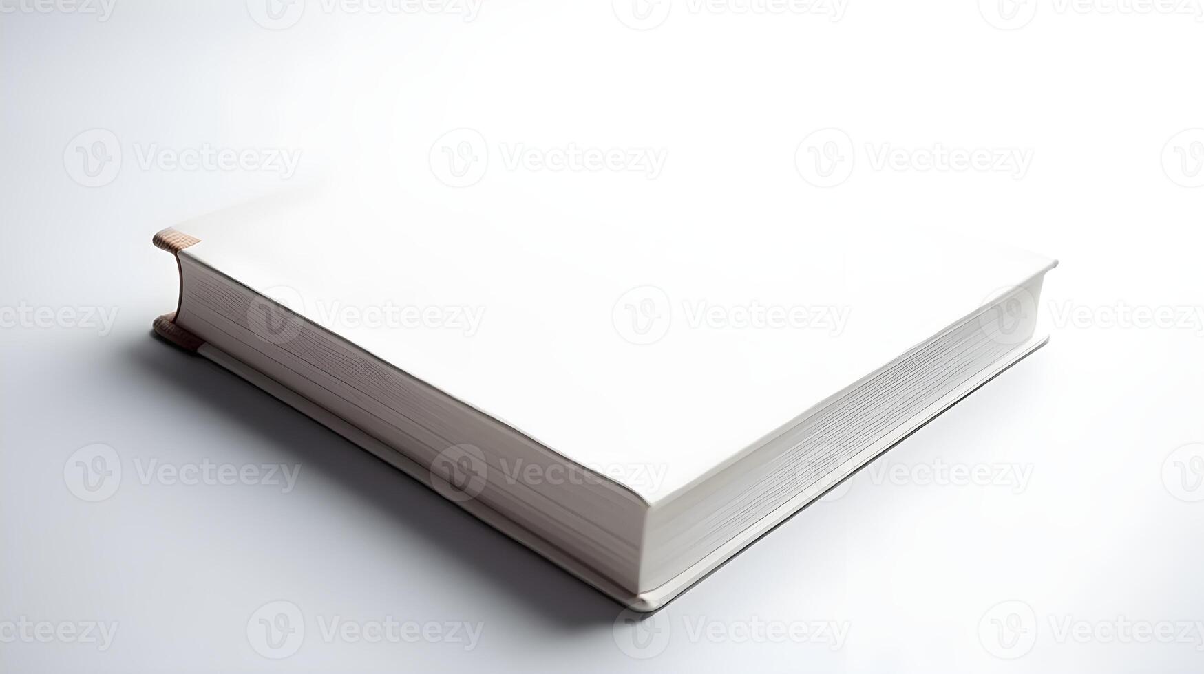 White hard cover book isolated on white studio shot. photo