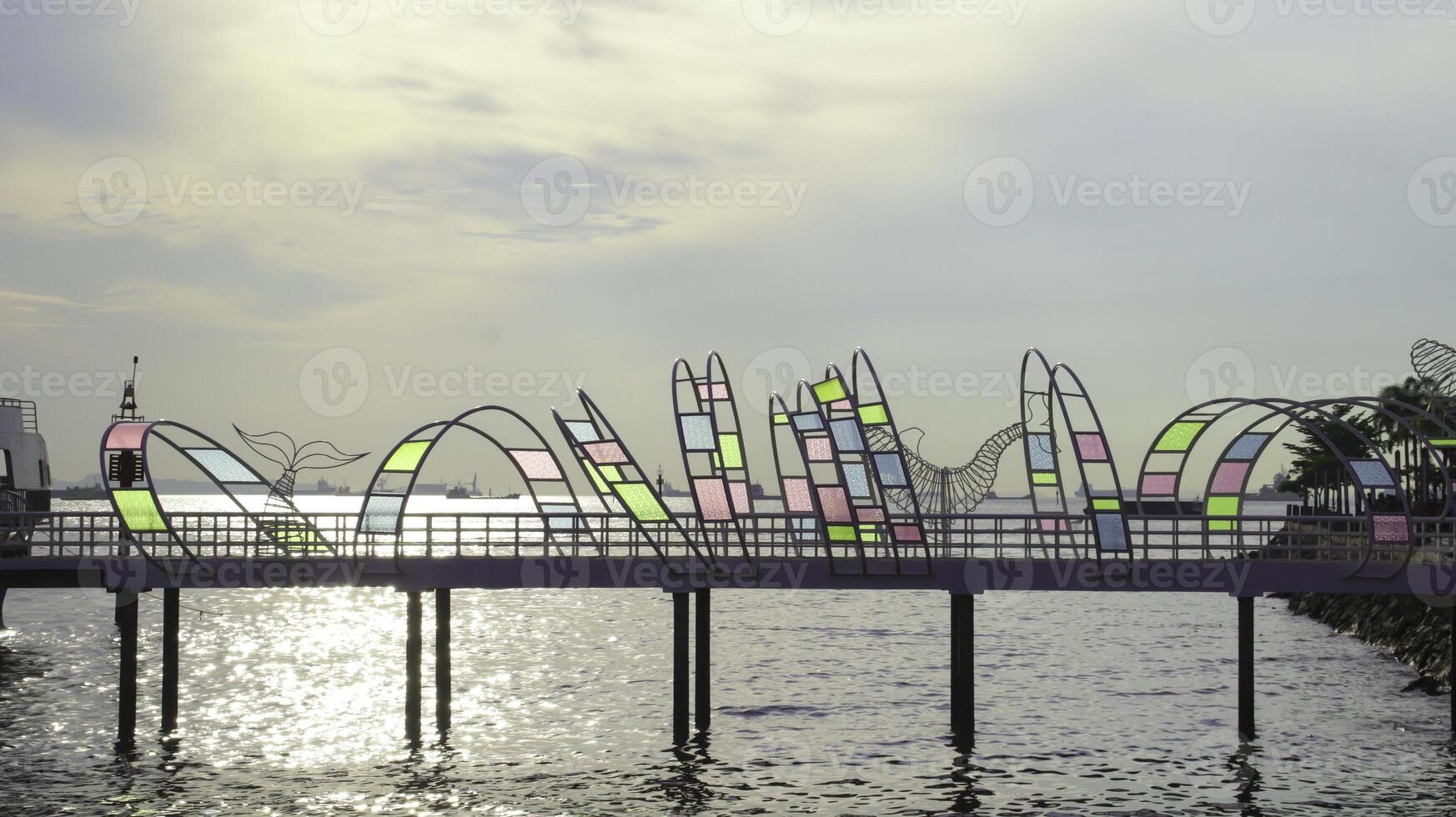 Beautiful harbor jetty ferry ship entrance in the afternoon sky background. photo