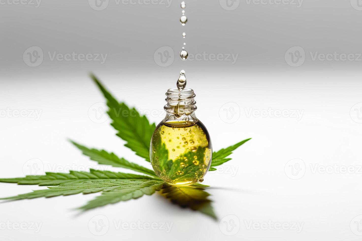 Cannabis extract oil drop and hemp leaf on white background. illustration photo