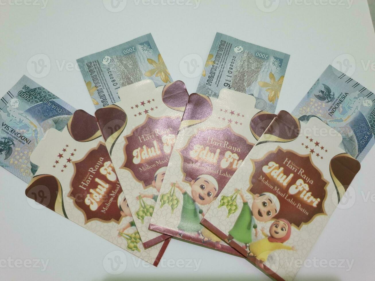 THR envelope containing money to be given to children or family or relations during Eid al-Fitr. photo
