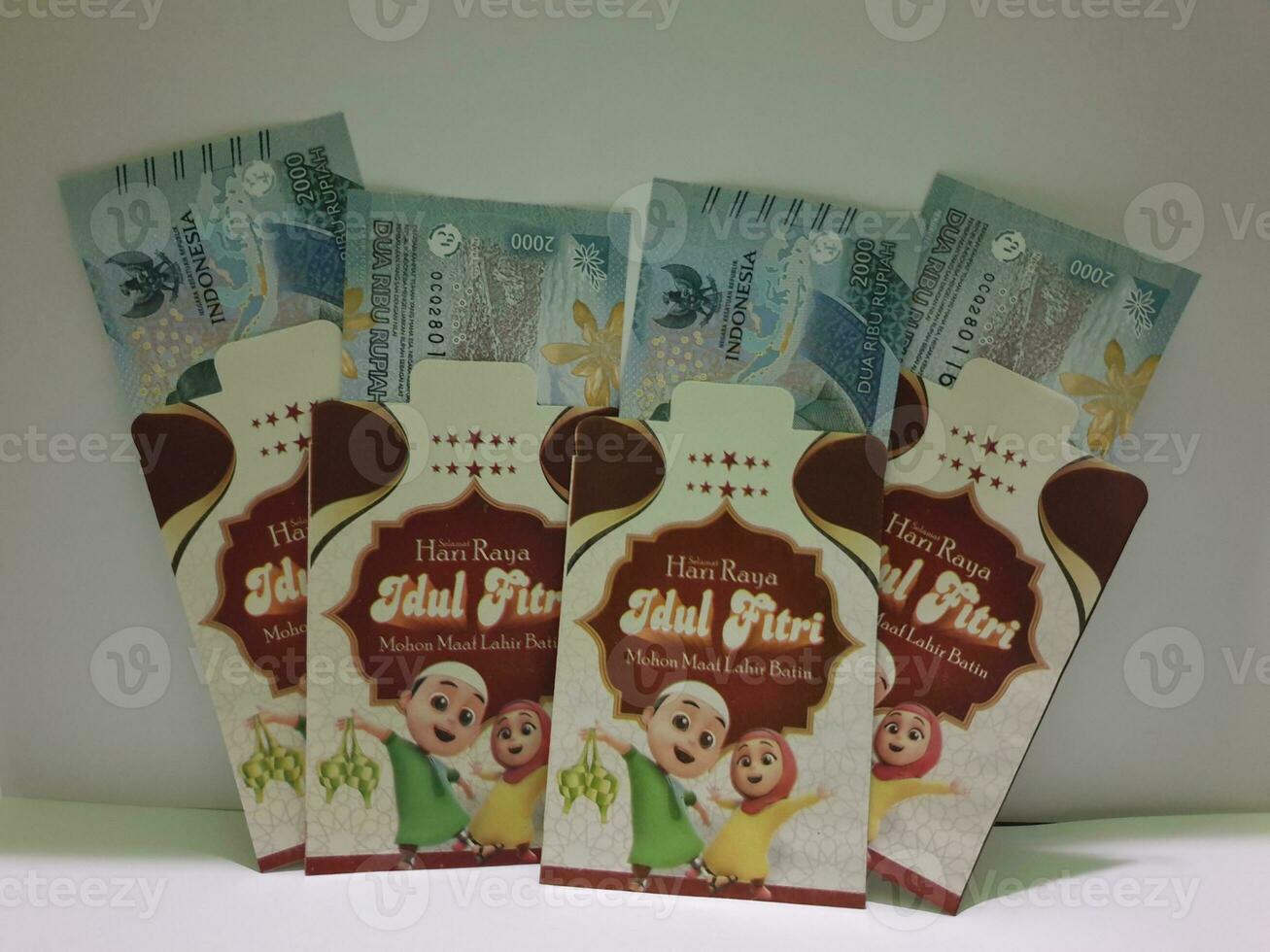 THR envelope containing money to be given to children or family or relations during Eid al-Fitr. photo