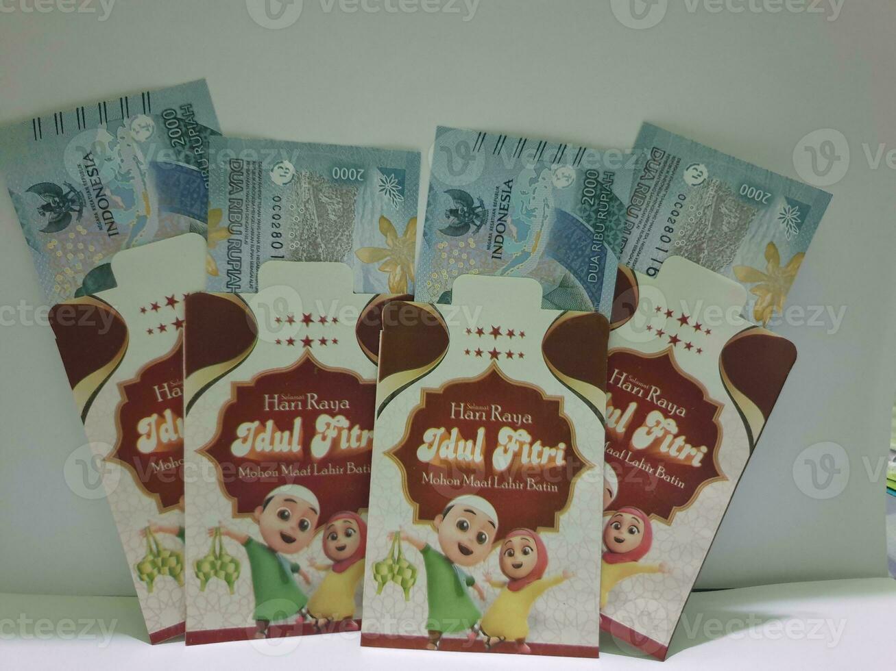 THR envelope containing money to be given to children or family or relations during Eid al-Fitr. photo