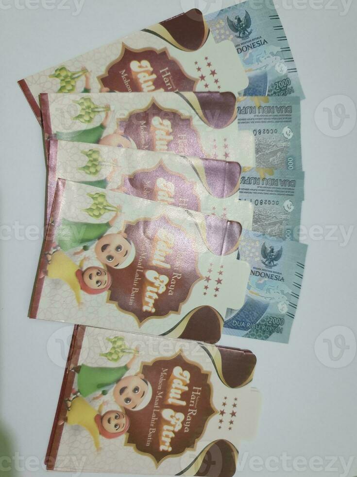 THR envelope containing money to be given to children or family or relations during Eid al-Fitr. photo