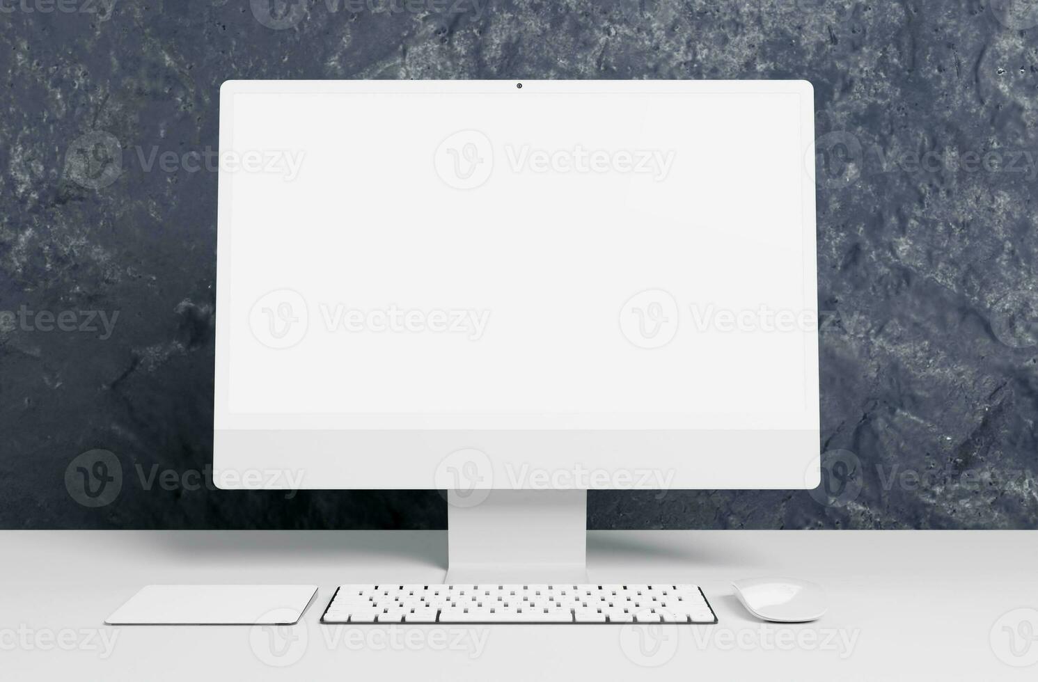 Computer clean work desk in white table and stone textured wall photo