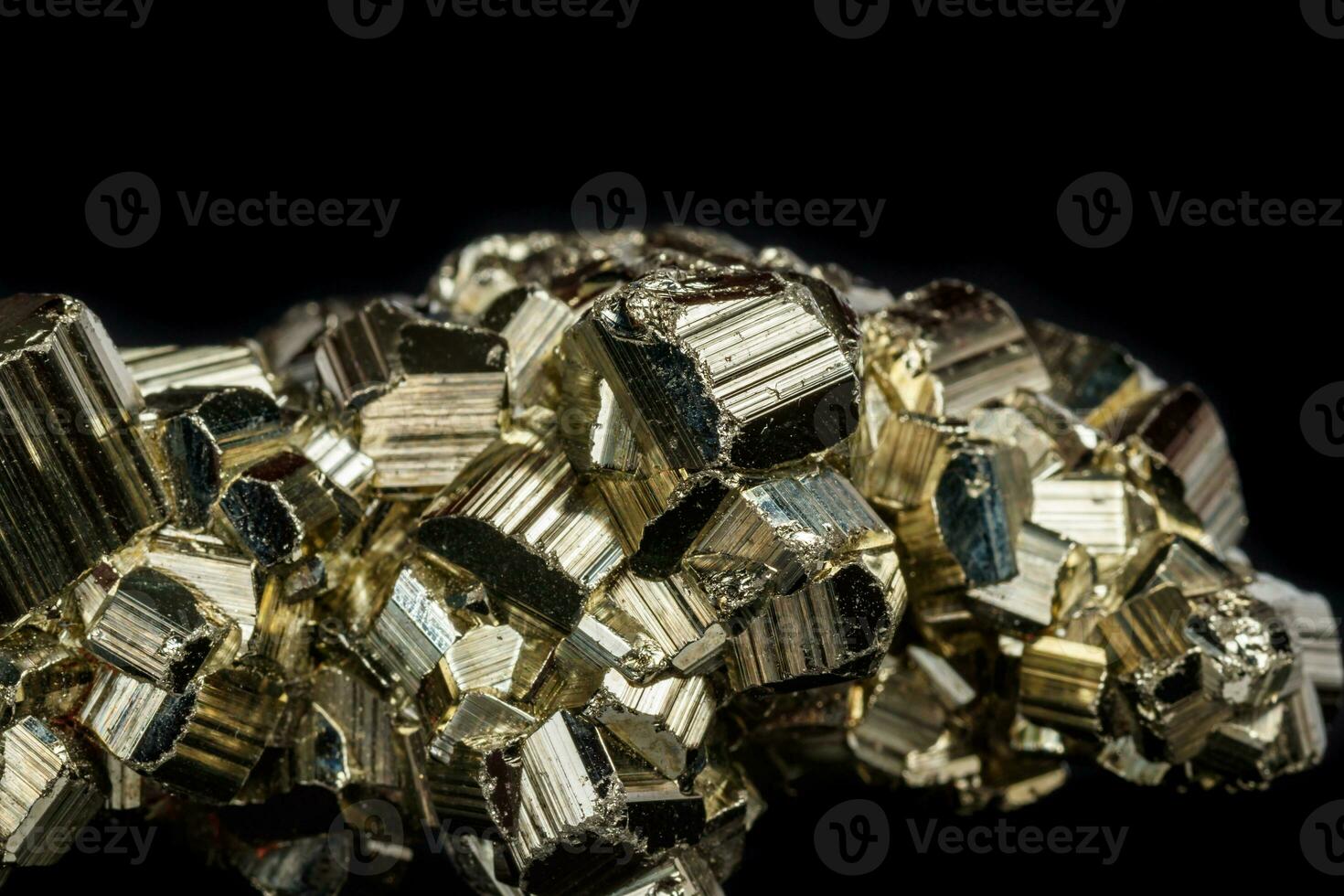 Macro mineral stone Pyrite on a black background photo