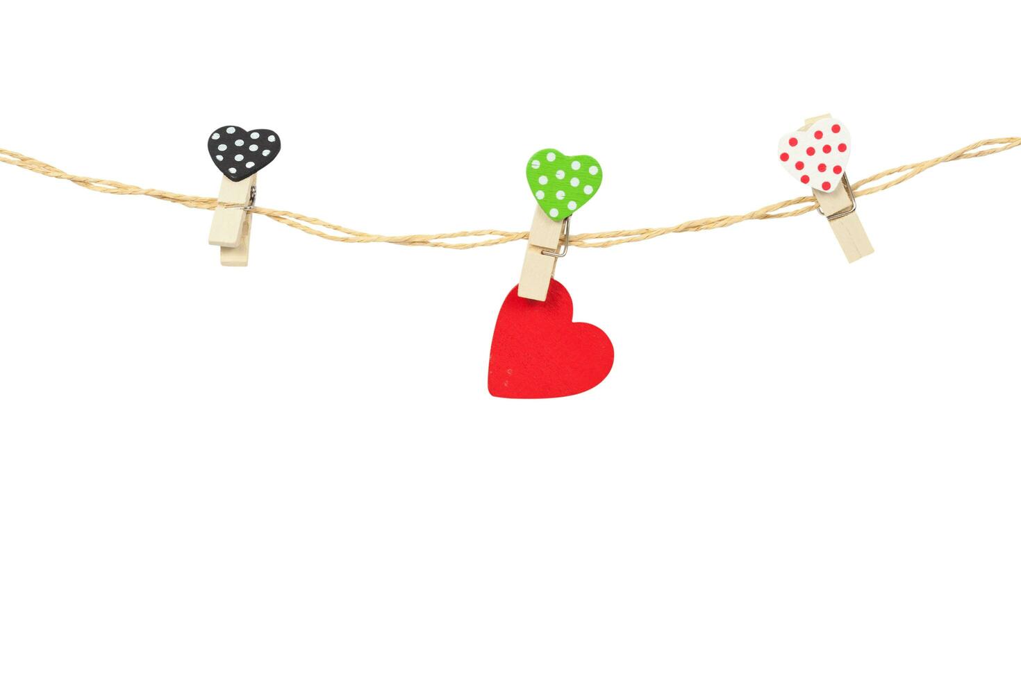 Handmade wood hearts hanging on cloth line or rope with photo