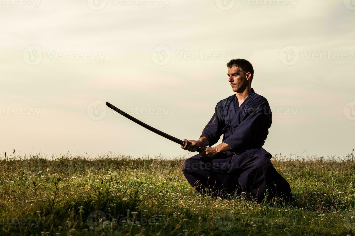 Kendo fighter holding bokuto photo