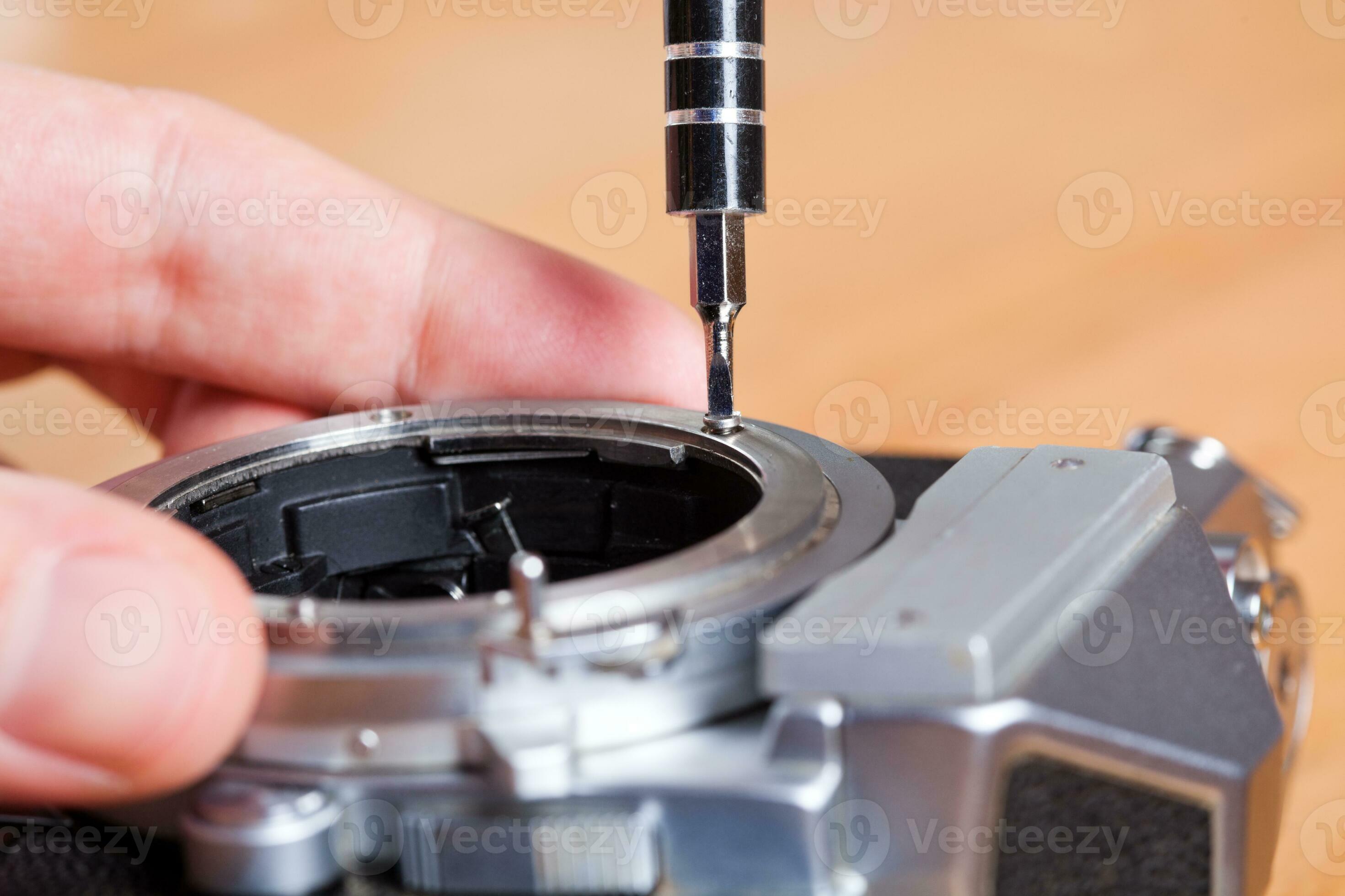 Camera being repaired 23539464 Stock Photo at Vecteezy