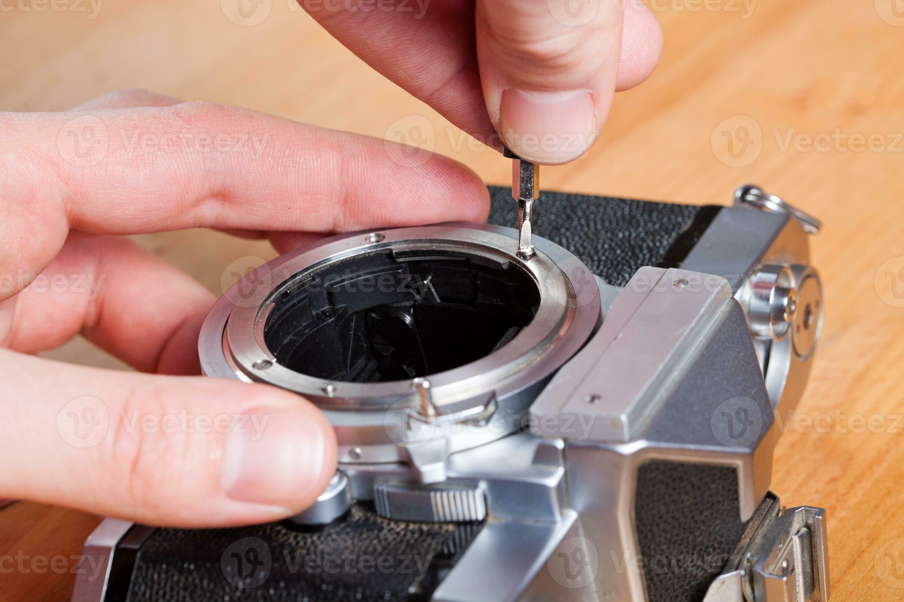 Camera being repaired 23539465 Stock Photo at Vecteezy