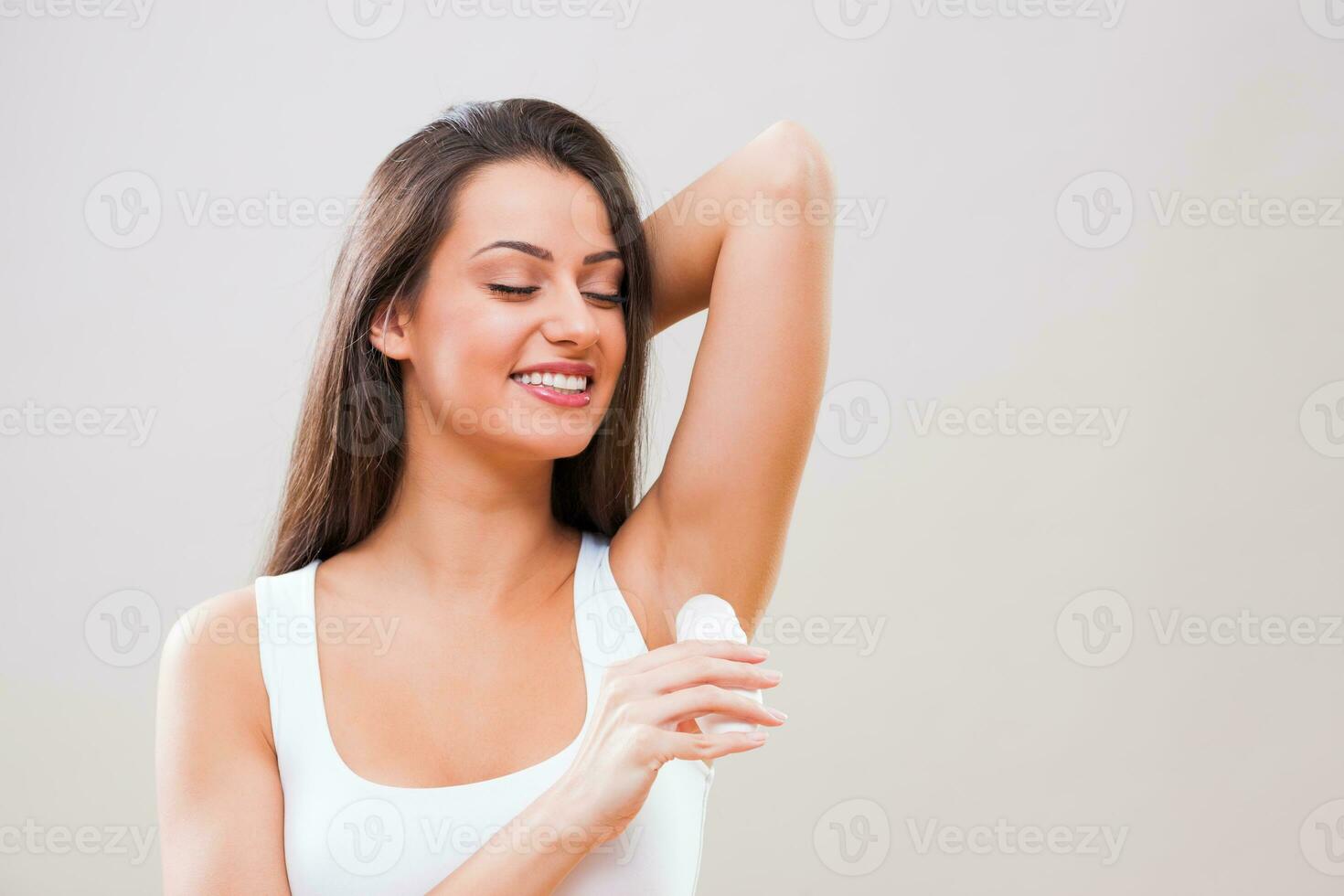 Woman with deodorant photo