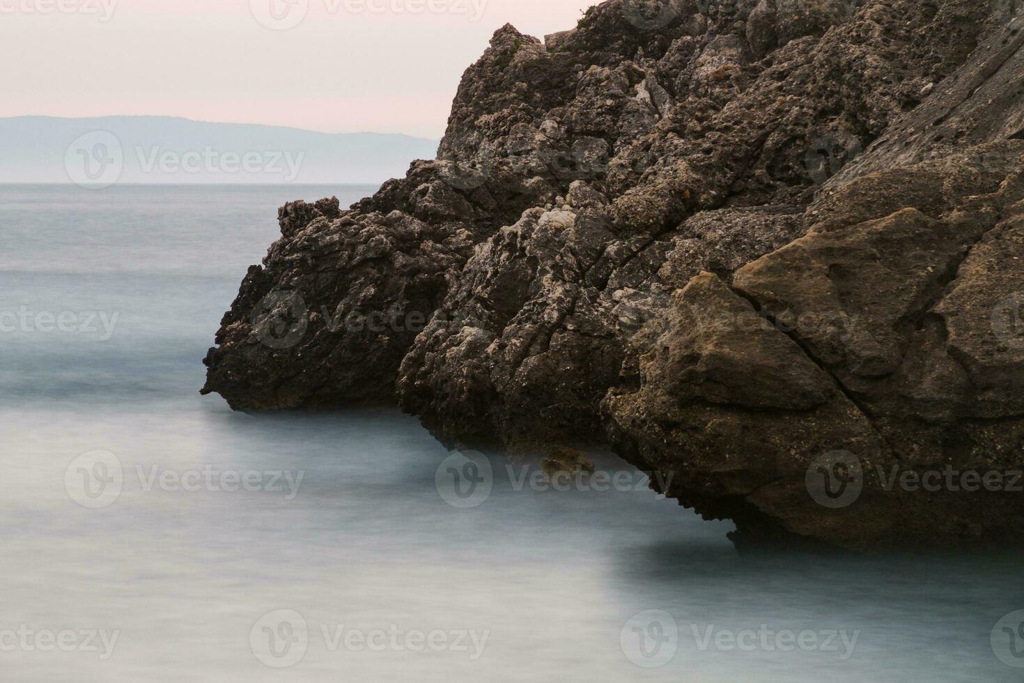 Scenic rocks by the sea photo