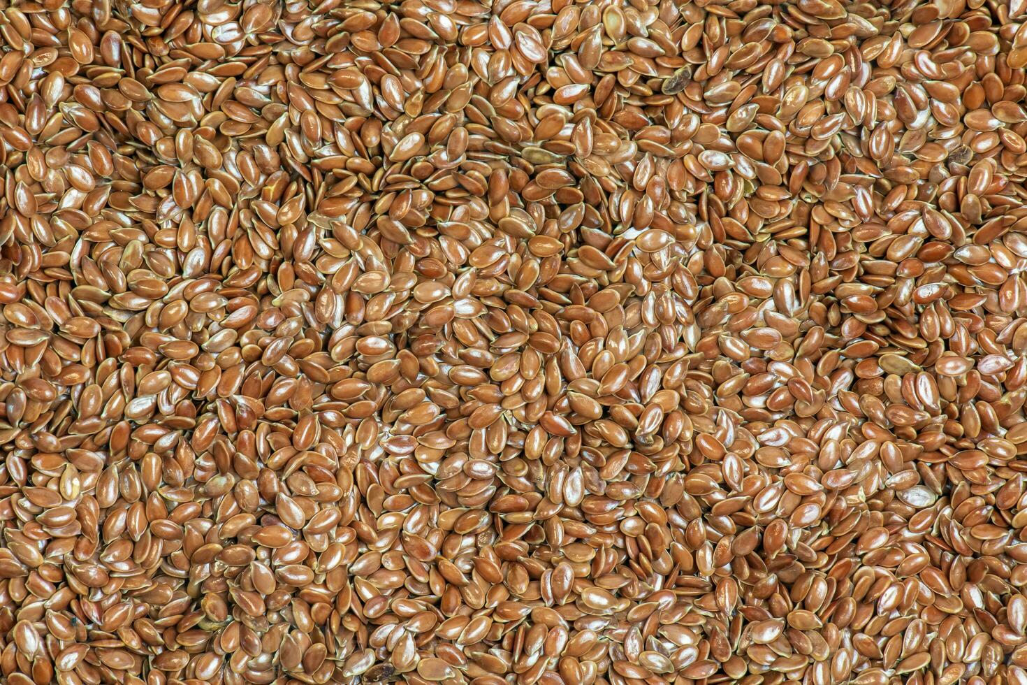 Flax seeds background or texture. Flaxseed or linseed. Cereals. Healthy food. Top view. photo