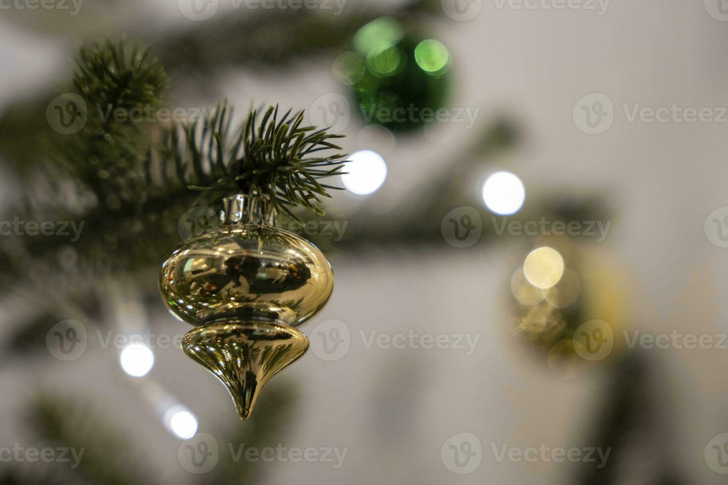 Christmas tree toys on spruce branches, Merry Christmas and Happy New Year photo