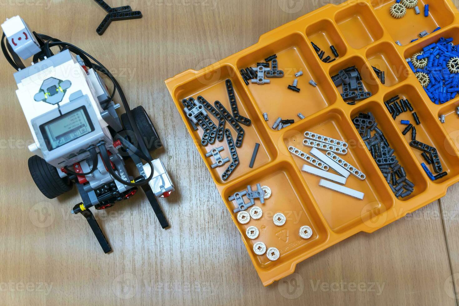 programmable children's robot assembled from designer parts photo