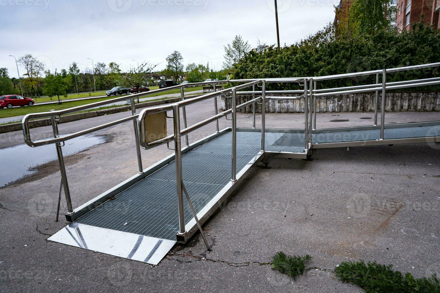 A ramp for people with disabilities near a public building. photo