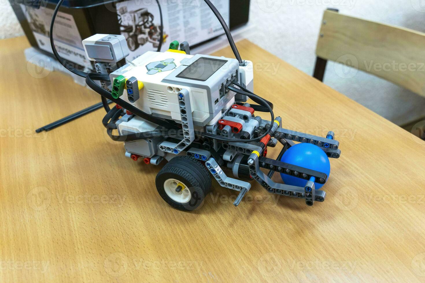 programmable children's robot assembled from designer parts photo