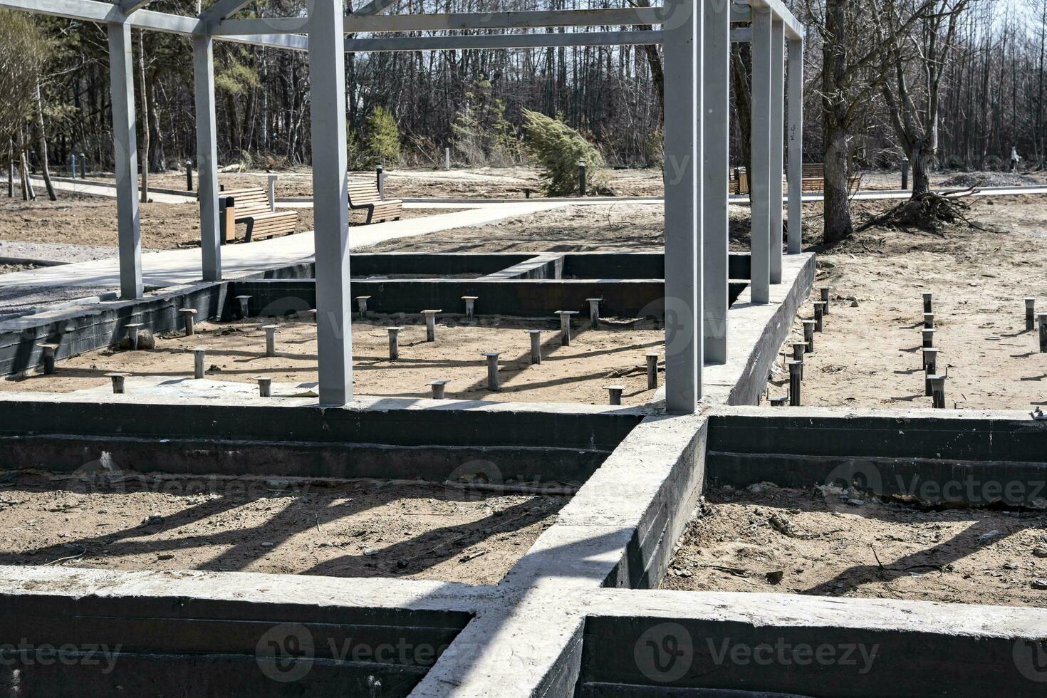 ribbon concrete foundation for the construction of a boat station photo