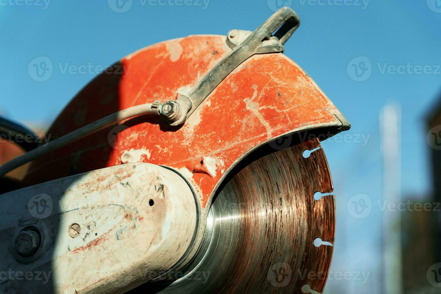 close-up of a saw with a disc for cutting concrete and paving slabs photo