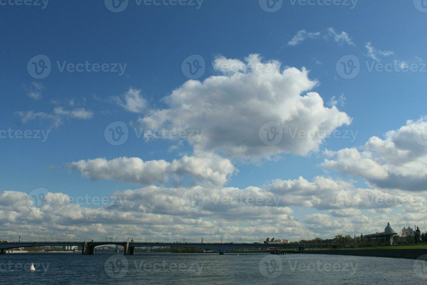 Panorama Dark sky and dramatic black cloud before the rain. rainy storm over the river. photo