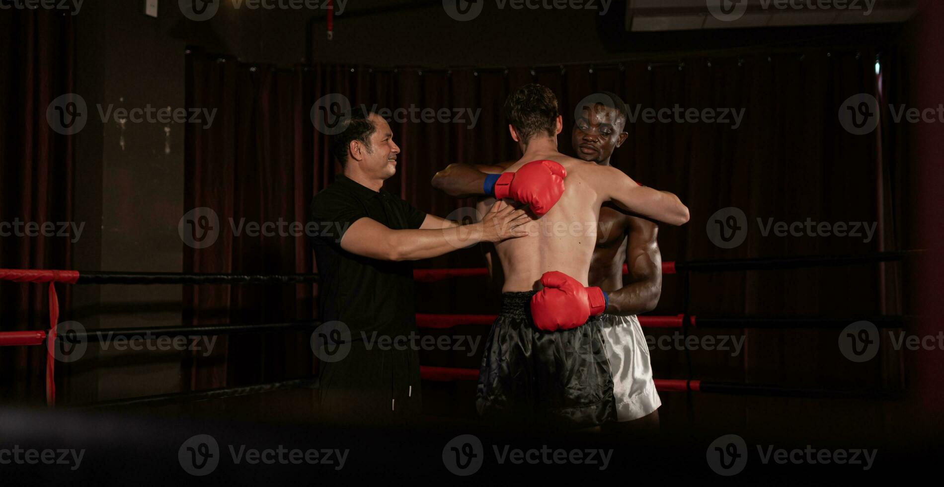 Victorious boxer the referee will raise their hands on stage, Muay Thai, Thai martial arts. photo