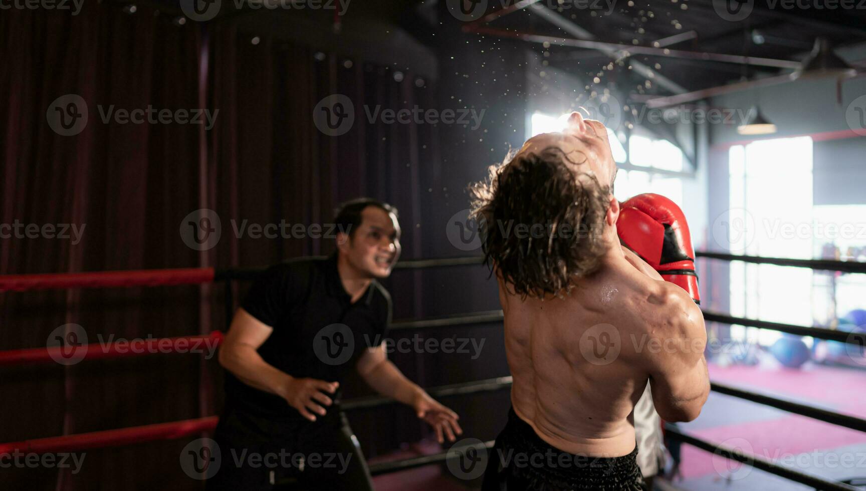 The power of the punch that hits the opponent's face can make faces look up and get knocked out, Muay Thai, Thai martial arts. photo