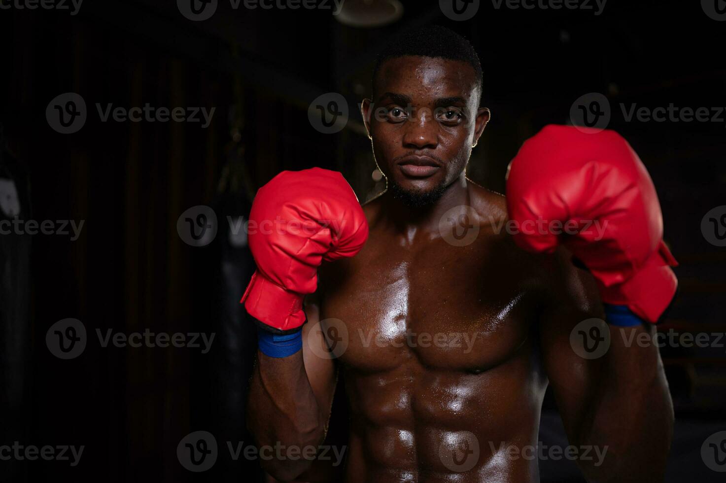 Portrait of foreign boxers vs Muay Thai, Is a Thai martial art of using weapons from the body such as fists, feet, knees, elbows. photo