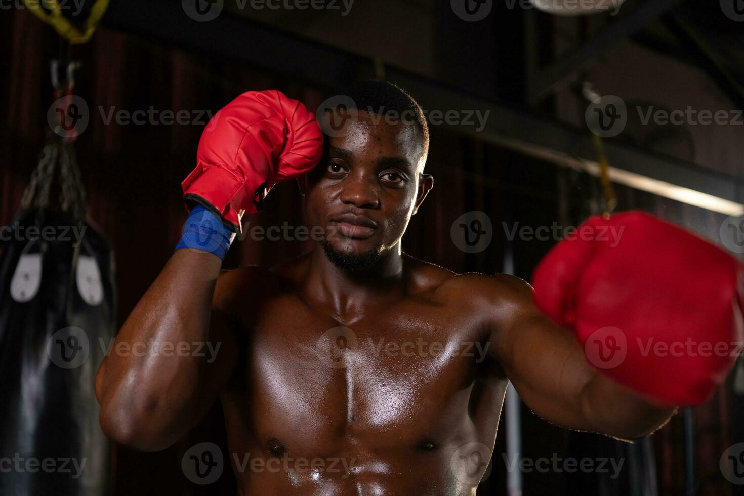 Portrait of foreign boxers vs Muay Thai, Is a Thai martial art of using weapons from the body such as fists, feet, knees, elbows. photo