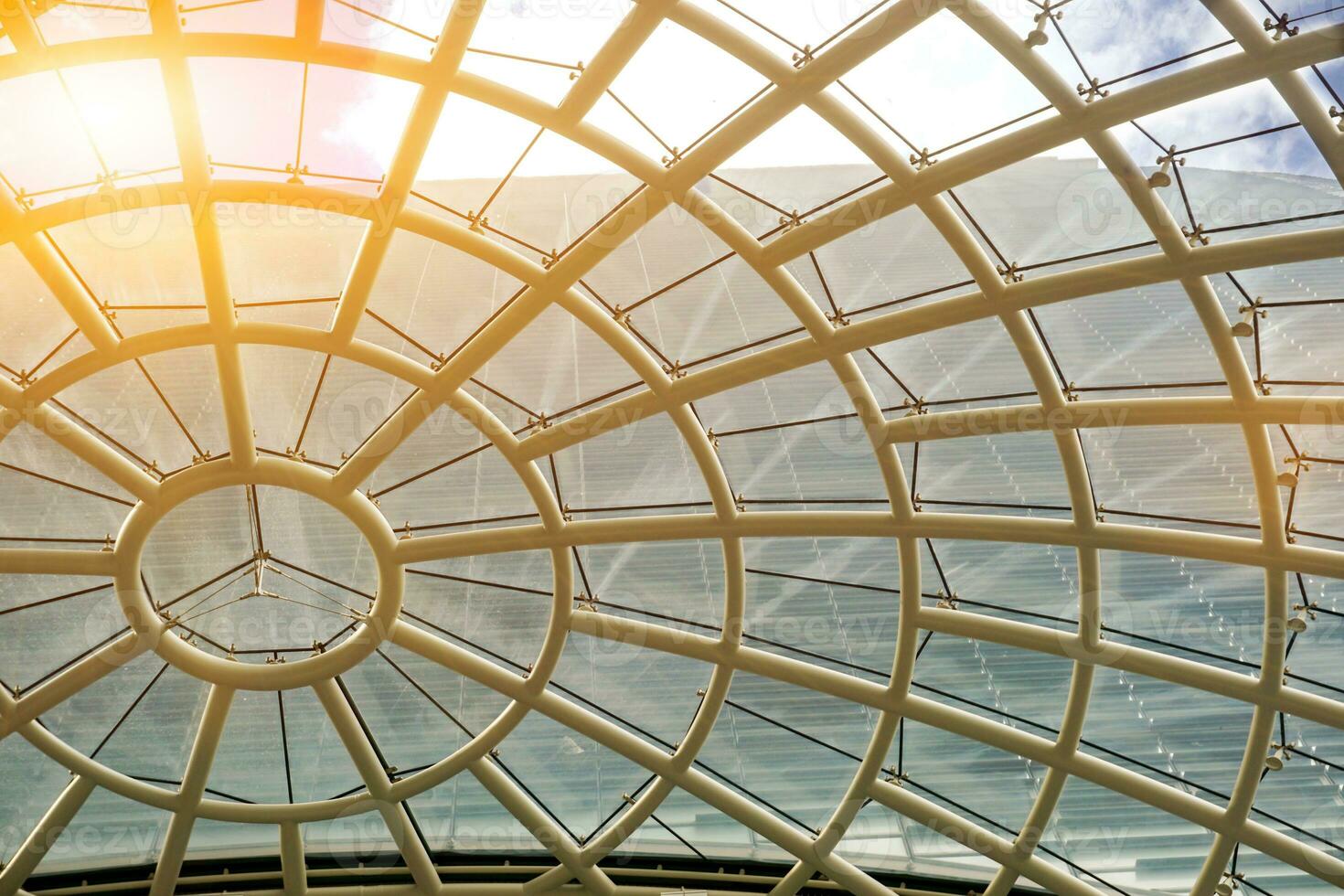 Building roof and glass ceiling of modern building. Roof and glass ceiling helping to light the building and reduce energy and It also the air to be poured easily. photo