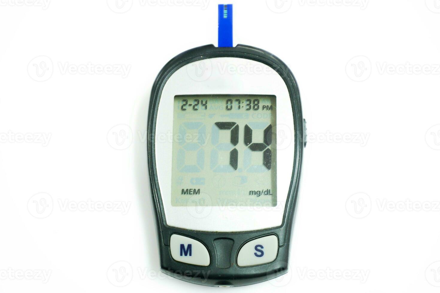 Top view glucose meter machine and numbers of glucose in the blood show on screen with sheet check isolate on white background and make with paths. photo