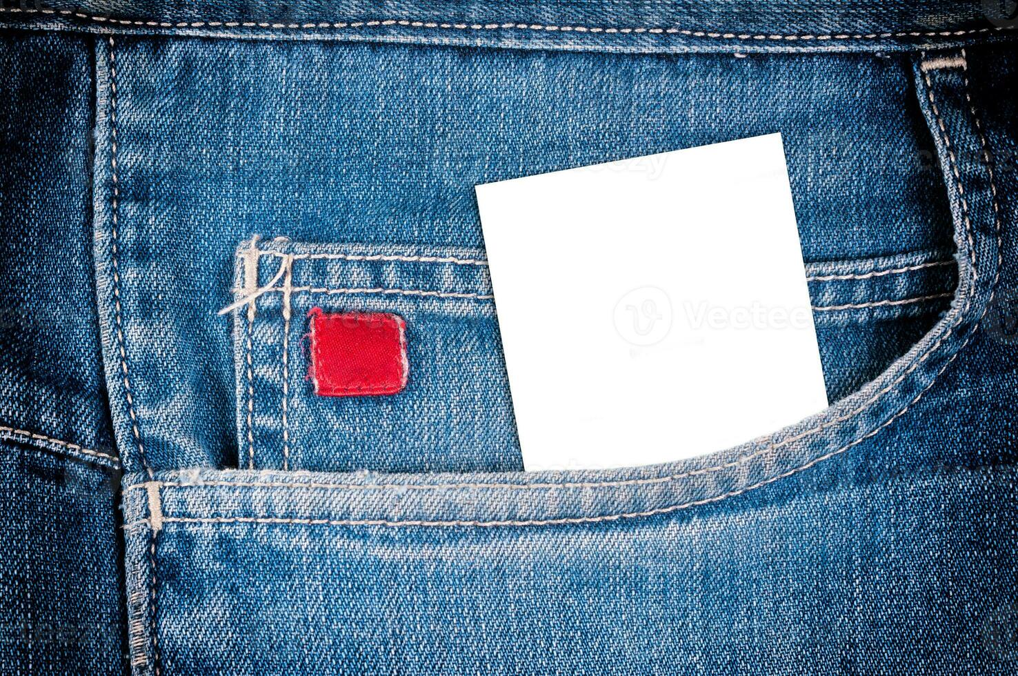 Jeans pocket with blank card photo