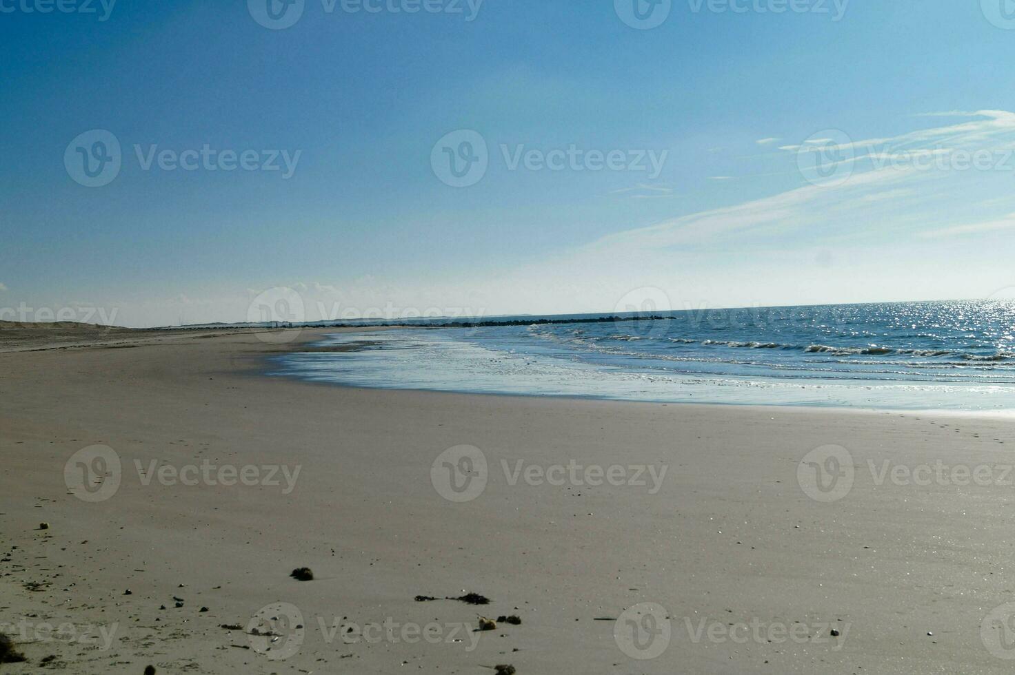 the endless beach at the northern sea Hvidbjerg Stranden Blavand Denmark photo