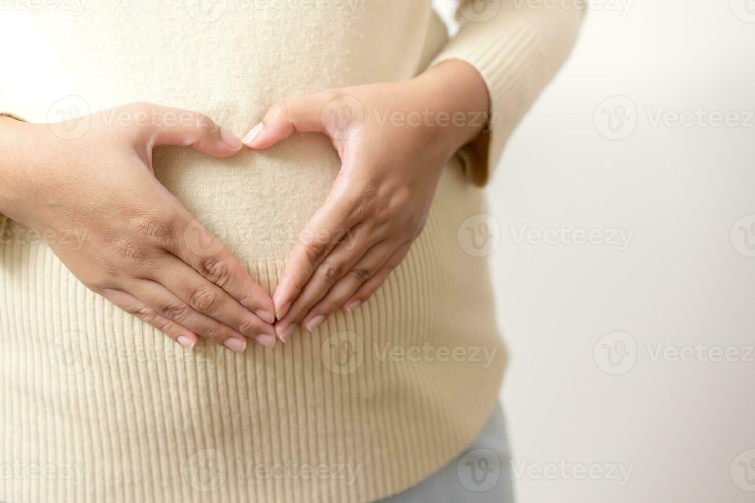 An obesity using measuring tape to show the real size. Chubby fat woman using measure tape at belly. Real size woman after gave birth to baby, real skin with wrinkles and scars. photo